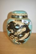 A Carlton ware lidded ginger jar decorated with gilt edging and Chinese dragon on a turquoise