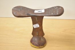 An African tribal wooden head rest with stud work decoration, h16.5cm