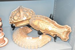 An early 20th century copper pan jelly mould in the form of a fish, L32cm, sold together with a