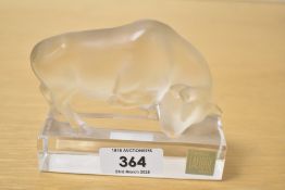 A Rene Lalique frosted crystal glass bull paperweight study having paper label for Lalique France,