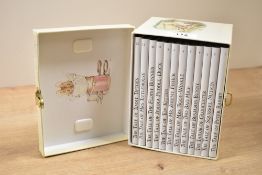 A set of 12 Beatrix Potter novels, to include The Tale of Peter Rabbit, The Tale of Squirrel Nutkin,
