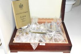 An Arthur Price of England Sheffield Cutlery set held within a mahogany canteen supported on block