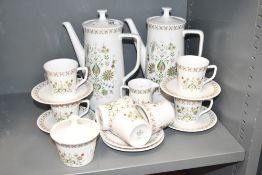 A Leftmann Weiden & Bavaria ceramic coffee service decorated with green foliage on a white ground,