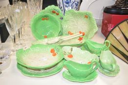 An assortment of lettuce leaf ware by Beswick Pottery, Carlton Ware and Devon Ware including bowls