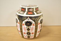 A Royal Crown Derby Imari 1128 pattern lidded ginger jar, decorated with gilt edging and floral