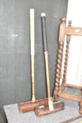 A pair of early 20th century Slazenger 'Corbally' croquet mallets, L77cm, (2).
