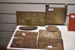 A Pinkrose metal plaque having Lancashire rose and mining pick, w17cm, sold together with a W.H.