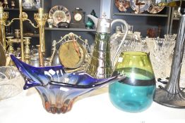 An Art Nouveau iridescent glass jug, possibly Kralik glass, having loop handle, h36cm, sold together