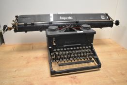 An early 20th century 'Imerial 58' manual typewriter complete with carriage, type mechanism,