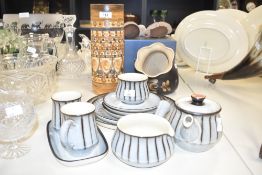 A Denby ceramic coffee service decorated in a blue glaze ground, ( 11 ), sold together with a