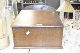 A 19th century oak clarks desk with fitted interior, w37cm