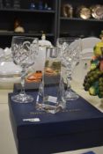 A Swedish Orrefors glass candlestick in the Tornado design, measuring 16cm high, together with a