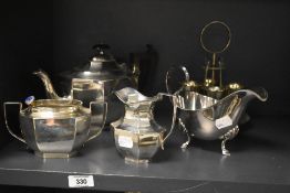 A silver plated 4 piece egg cruet set with spoons, h21cm, sold together with a silver plated sugar