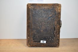 A 19th century embossed leather and gilt Carte de visite album, inside reading, 'The Victorian