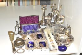 A group of silver plated tableware, to include a Samuel Peace carving knife, a salt cellar set, a