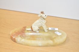 An early 20th century metal terrier mounted on a marble ash tray base, w20cm