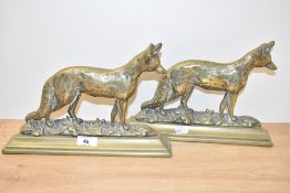 A pair of brass door stops in the form of a standing fox, L29.5cm