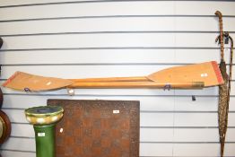 A pair of vintage wooden canoe oars / paddles having brass handles, L120cm