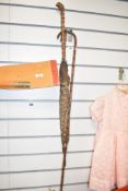 An early 20th century bamboo walking stick, L88cm, sold together with a vintage umbrella, ( 2 ).