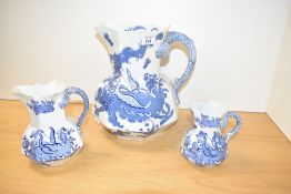 A large Mason's ironstone blue and white jug decorated with Chinese dragons, h27cm, sold together