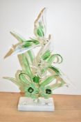 A rare Beckhurst art glass sculpture, decorated with hand blown birds and foliage, supported on a