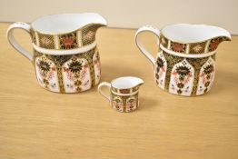 A Royal Crown Derby Imari 1128 pattern cream jug, maker marks to base, h9.5cm, sold together with
