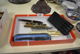 A selection of decorative ballpoint and fountain pens including Papermate cartridge fill fountain