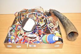 A box containing various African beaded jewellery, sold together with a hand carved water buffalo