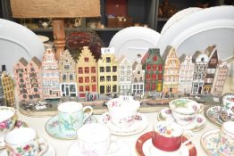 A selection of vintage pottery houses by Wonderworld and John Hine completing a terraced house canal