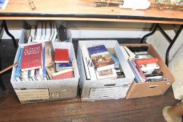 Four boxes containing various military and history books, to include The Highland History by the