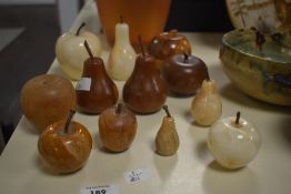 A group of hand turned wooden and alabaster pears and apples, (12).