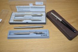 A collection of Parker fountain and ballpoint pens including a 45 Flighter set, a boxed 45 in