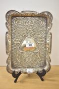 An Art Nouveau silver plated tray having embossed floral decoration, w27cm