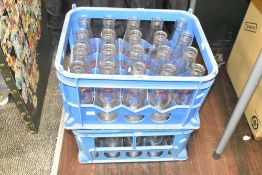 Two milk creates each holding 20 glass bottles reading 'Brandleyfield Dairy, Kendal'.