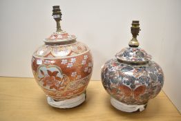 A Chinese style table lamp of lobbed form, decorated with butterflies and foliage on a crackle glaze