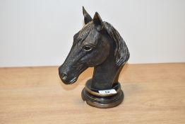 A Leonardo cast metal horse bust on circular plinth base, h19cm