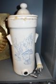 A late 19th / early 20th century stoneware water filter with chrome tap, decorated with
