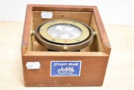 A Steamer Brand nautical brass compass encased in a mahogany lidded box, w16cm