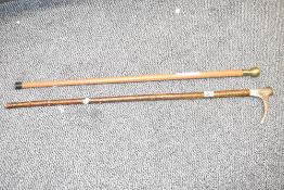 A horn handle walking stick inscribed to top with logo reading 'Fortiter-et Recteu, L84cm, sold
