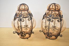 A pair of Murano style hand blown caged glass chandeliers, h27cm