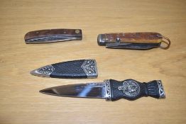 A Scottish Sgian Dubh decorated with Clan Campbell crest and Scottish thistles, L18cm , sold