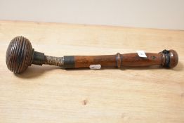 A 19th century mahogany priest having a turned wooden ball head attached by leather rope, L37cm