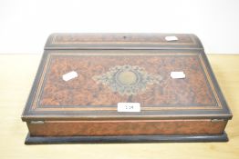 A 19th century burr wood writing slope on plinth base, the interior fitted with red leather and