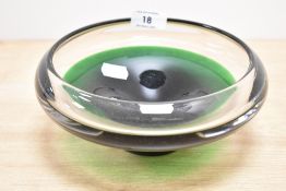 A vintage Flygsfors green glass bowl, w20cm