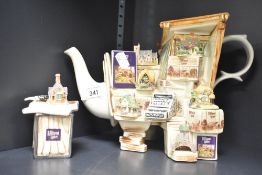 A Lilliput lane ceramic tea pot decorated with miniature country houses, signed to base, h20cm, sold