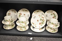 A Crown Staffordshire fine bone china part tea service, decorated with strawberries and butterfly'