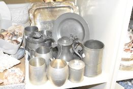 An assortment of Pewter and Silver plate to include steins and plates etc.