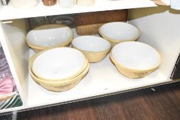 A set of 6 large T. G. Green & Co LTD bowls decorated with geometric patterns on a cream glazed