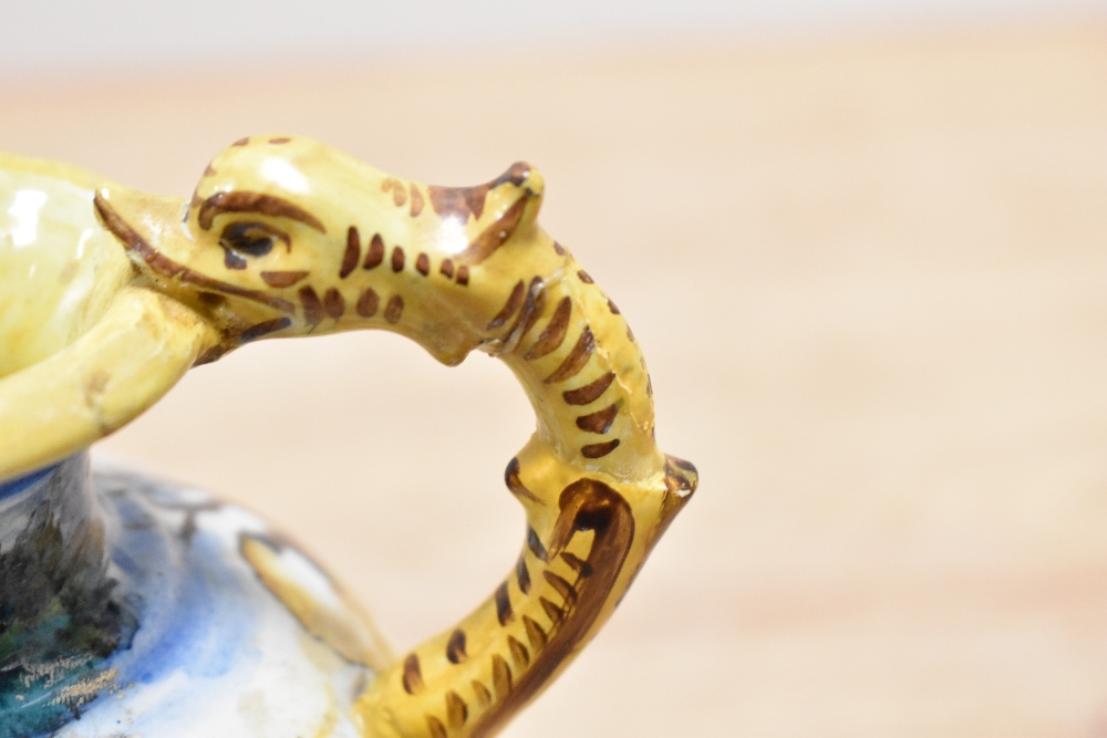 A Majolica style vase decorated with multiple colour glazes and fish form handles, supported on - Image 3 of 4