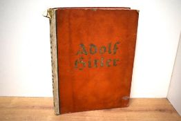 Nazi Germany. A 1935 photo-book titled: 'Adolf Hitler'. Contains many mounted photo-plates. Original